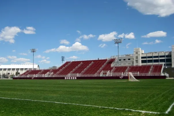 A quiet sports stadium under bright lights